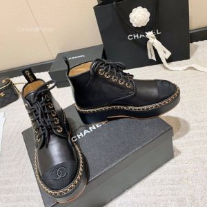 Chanel CC Logo Lace Up Chain Leather Ankle Boot in Black 2281853